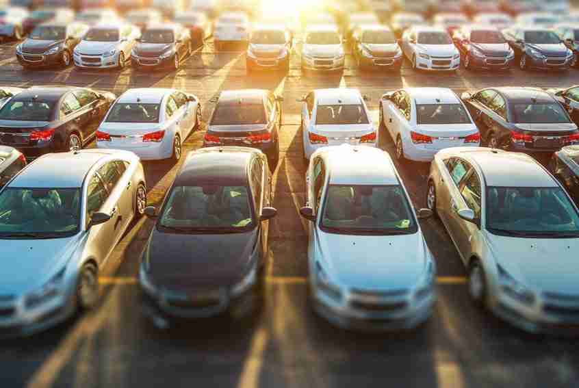 dealership vehicles in a parking lot