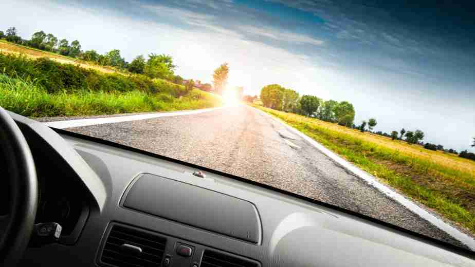 6 Steps to Help You Close More Car Deals 9 Car driving in the sunset