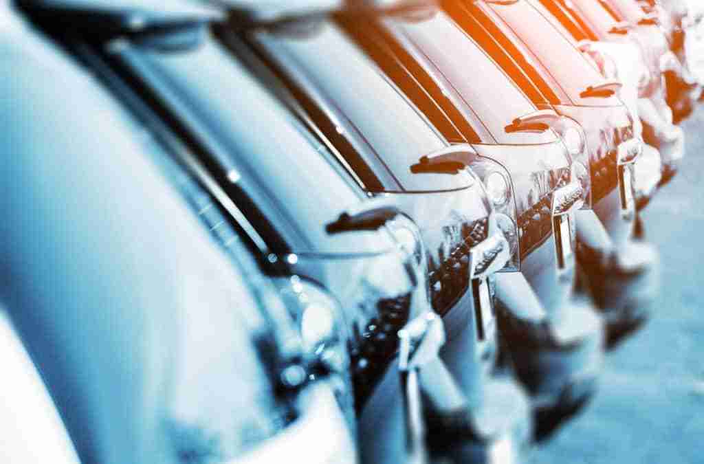 Car Dealers Everywhere Must Read This: How to Persuade Someone to Buy Something They Don't Know They Need 5 Back of new vehicles at car dealership